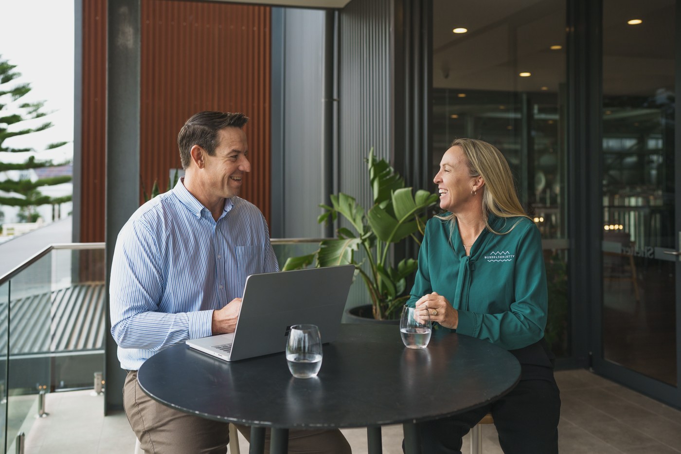 Steven consulting with a staff member from Busselton Jetty, amd.